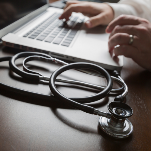 Do I Need A Medical Exam To Become A Foster Carer? - stethoscope and laptop